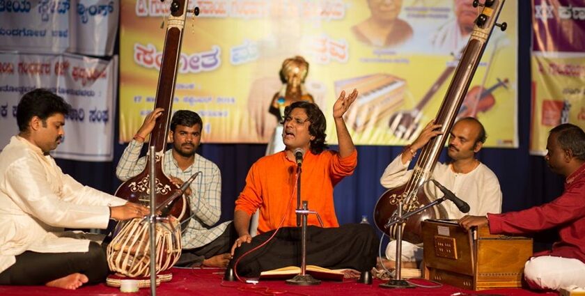 An image of a vibrant classic performance at the Sawai Gandharva Music Festival in Pune.