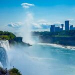 A breathtaking view of the waterfall, showcasing the powerful water cascading down.