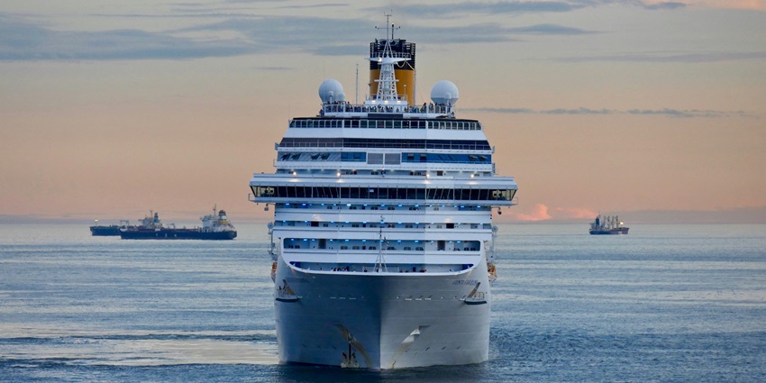 A view of a splendid ship sailing through the glistening blue waters of the region.