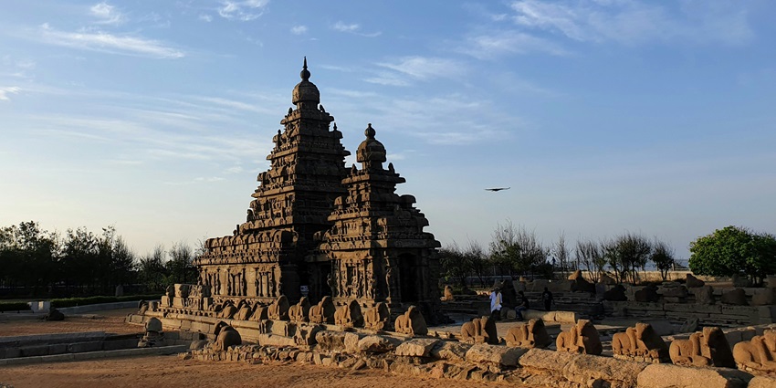 View inside the temple courtyard with the clear blue sky in the background