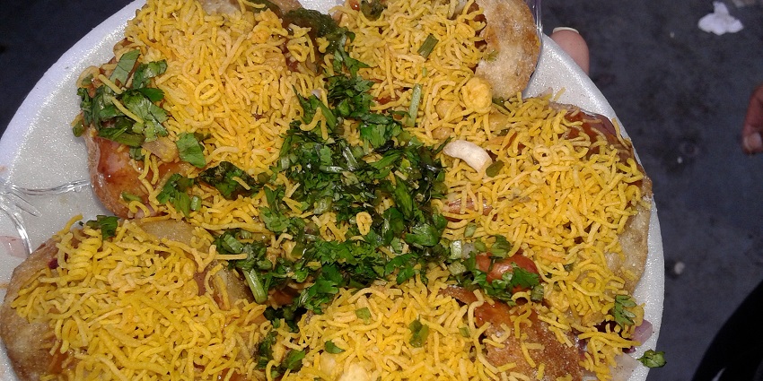A plate of sev puri, one of the best street food in panchkula for a quick snack