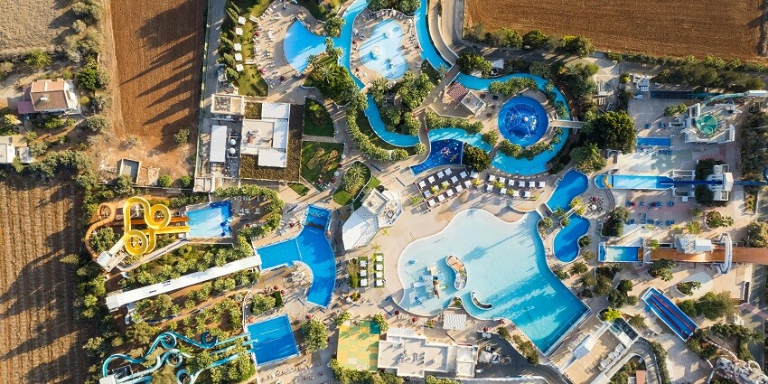 An aerial view of the leisure hub of Odisha featuring thrilling rides and serene pools.