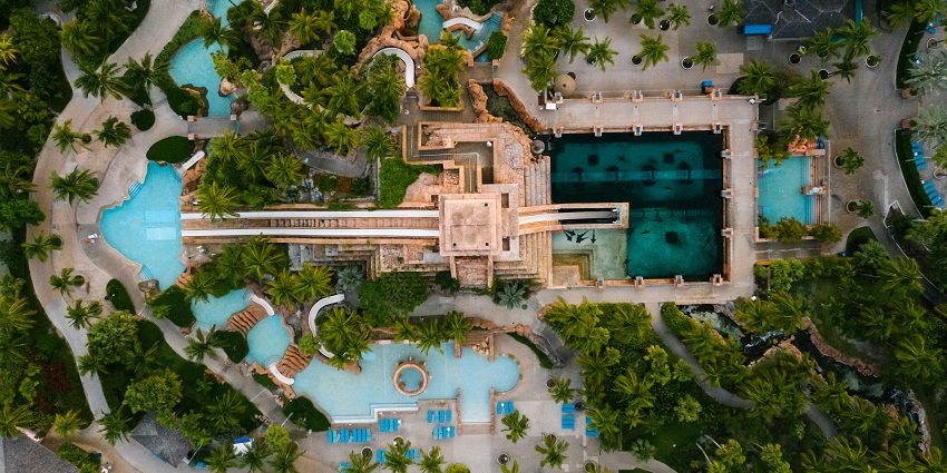 Vibrant water slides and bright pools in a sunny oasis at Shangrila Water Park in Kalyany.