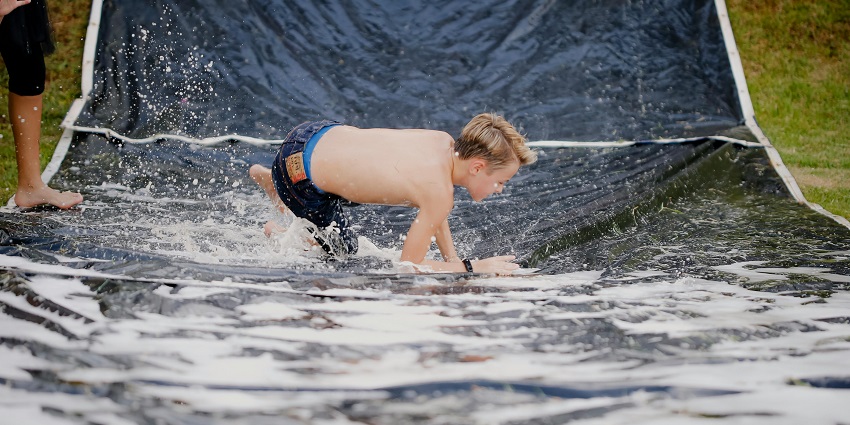 This photo shows a young boy sliding down at one of the water parks inMatheran.