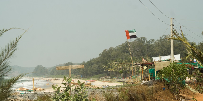 Shiroda Beach, featuring golden sands and gentle waves, offers a seaside view.