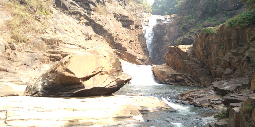 Shiva Ganga Falls feature stunning waterfalls surrounded by lush greenery for travellers.