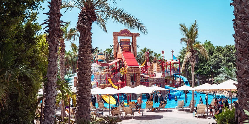 Yellow and blue giant water slide at Shivaji Water Park, which is fun for families