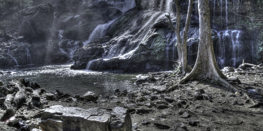 View of the sparkling water cascading down rocks