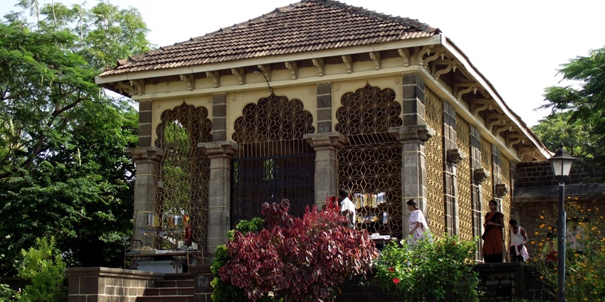Scenic view of Shivneri Fort surrounded by greenery, near the waterfalls in Maharashtra.