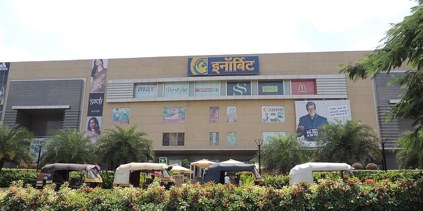 A bustling interior of Inorbit Mall with shoppers exploring various things to do in Vashi.