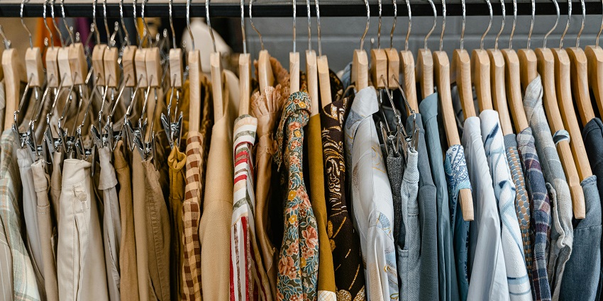 An image of a stall selling different kinds of clothes in the local market in Ahmednagar.