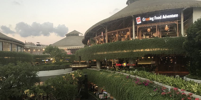 A beautiful picture of the entrance of Beachwalk Shopping Centre in Kuta, Bali