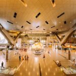 An inside view of a mall in Maharashtra with plush settings and bright coloured lights.