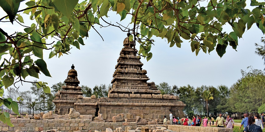 Image of the Shore Temple in Mahabalipuram at dusk, showcasing its ancient architecture.