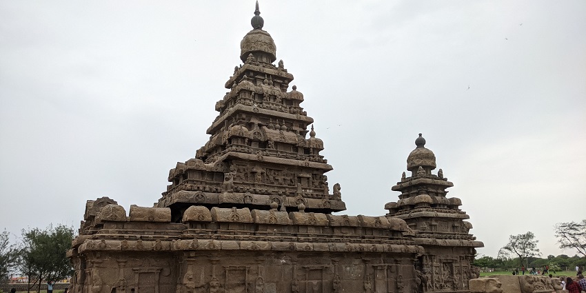 Ancient temple complex overlooking the sea, showcasing exquisite architecture.