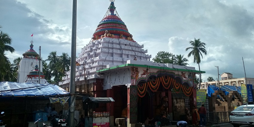 A view of the Shree Biraja temple whose spire is painted in vibrant colours