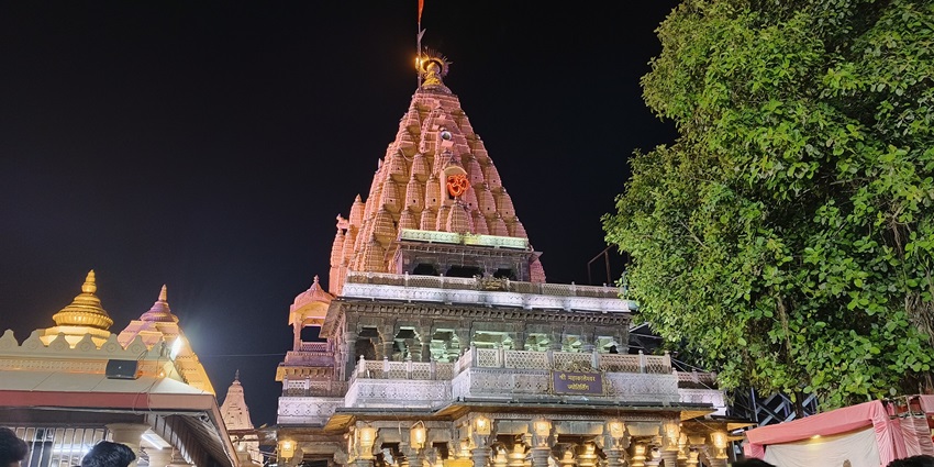 A sacred Jyotirlinga temple in Ujjain, illuminated during the Bhasm Aarti, one of the best places to visit Madhya Pradesh for couples.