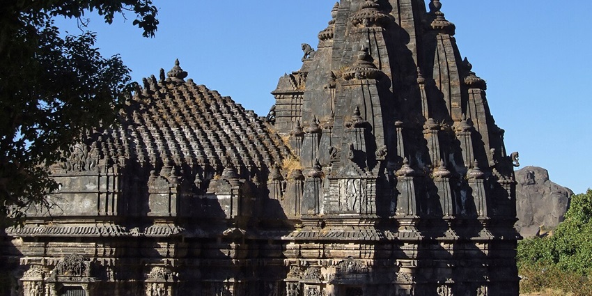 Close up view of the intricate carvings on the temple offering a glimpse of the cultural heritage of Pune.