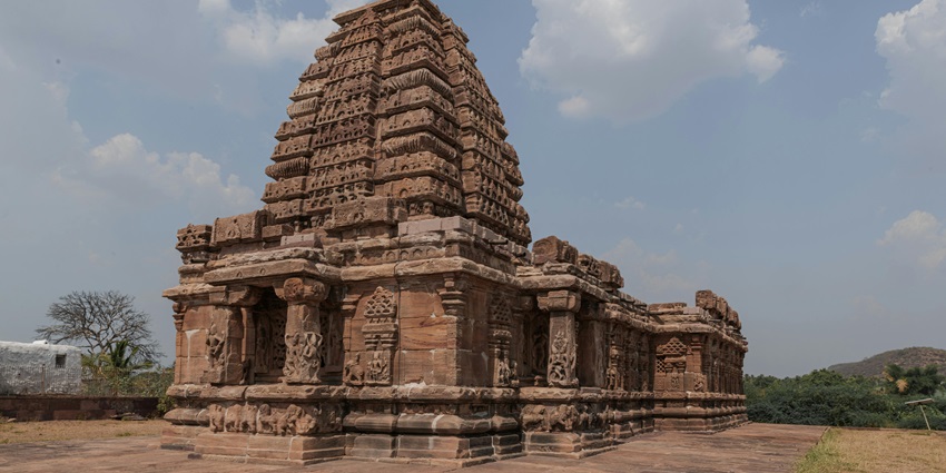 Five-tier Rajagopuram and octagonal Krishna shrine in Nanganallur, Chennai, with Pallava-era architectural elements.