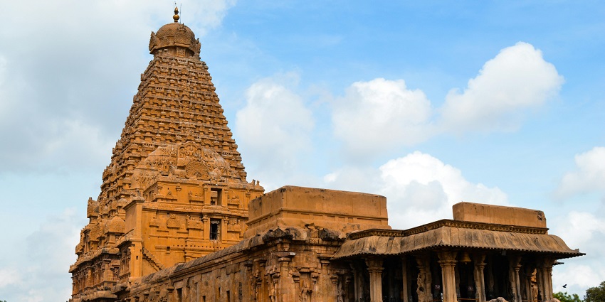 An image of Sikkal Singaravelan temple, featuring intricate stone carvings and architecture.