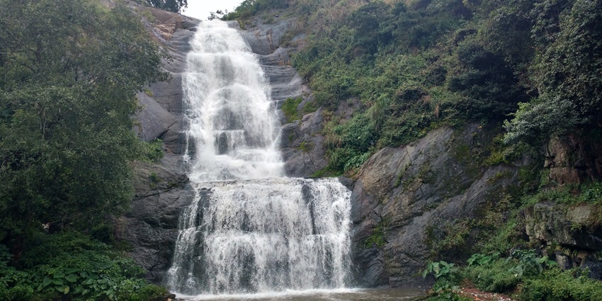 Silver Cascade Falls cascading down rocks near Kodaikanal - one of the places to visit near Palani.