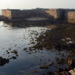 The back wall of Sindhudurg Fort showcases its historic architecture and iconic brilliance