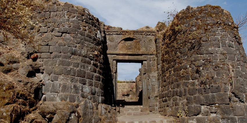 One of the places to visit in Pune with family is the historic Sinhagad Fort on a hill with scenic vistas.