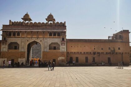 Gate of Sitabuldi Fort in Nagpur, Maharashtra, with a stone structure and clear sky.