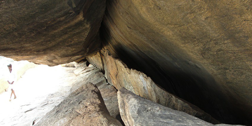 Ancient cave site with stunning rock paintings and history.