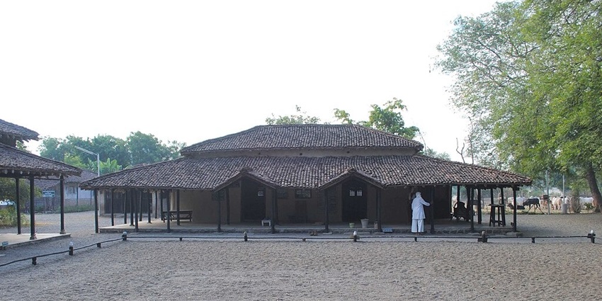 Natural cavern known as Skandashram, surrounded by lush greenery and serene landscapes