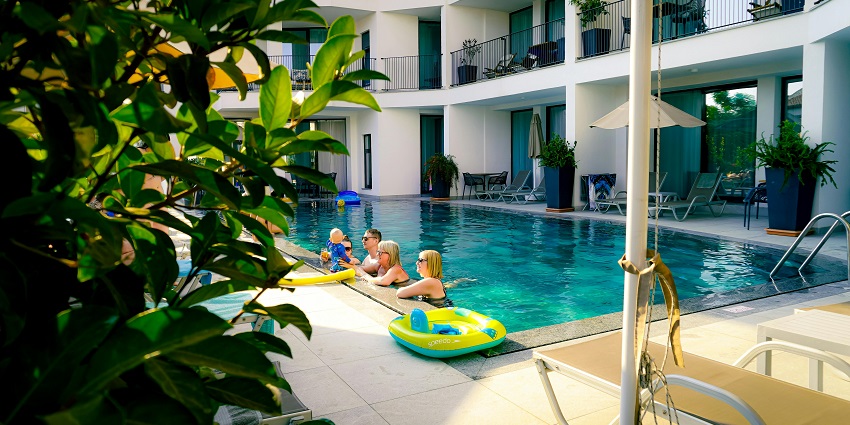 Pool party in Bikaner offering amusement rides and family-friendly accommodations.