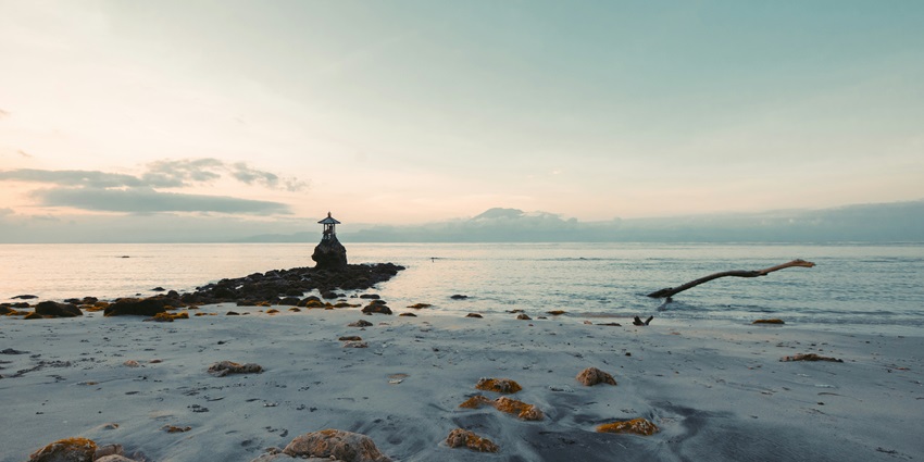A breathtaking vista of pristine golden sands and glistening waters of Crystal Bay.