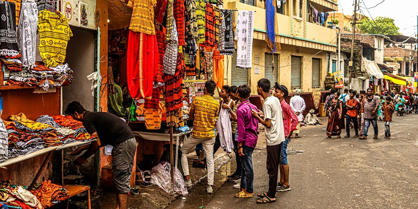 Vibrant Solapur textile market showcasing colourful cotton chaddars and local craftsmanship