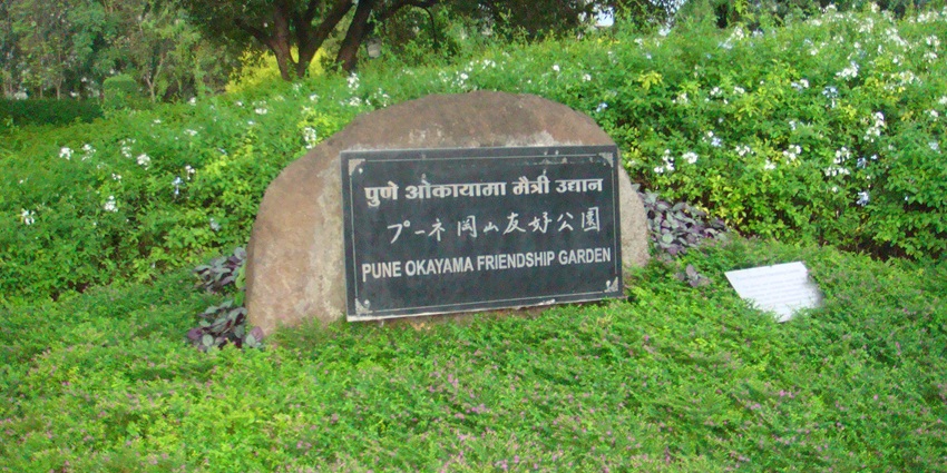Scenic view of Pune-Okayama Friendship Garden with lush greenery.