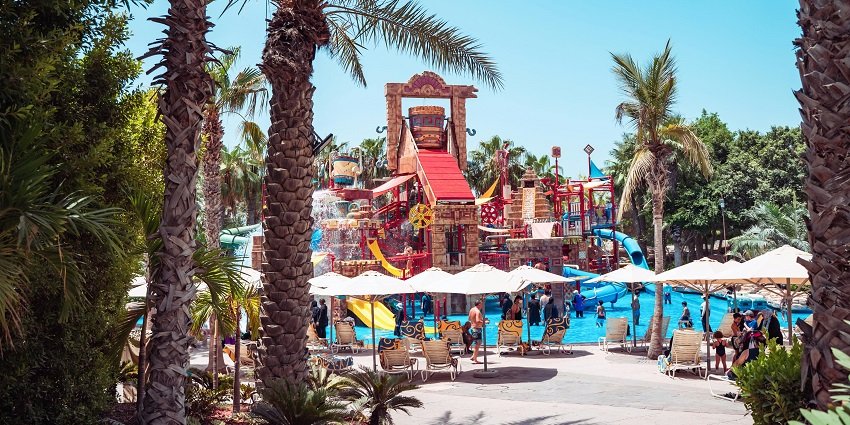 A glimpse of people enjoying the vibrantly coloured rides and wave pools at the Splash.