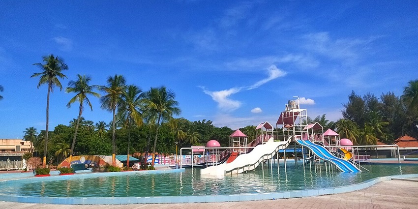 A bustling poolside scene at Splash, The Fun World water park in Uttar Pradesh