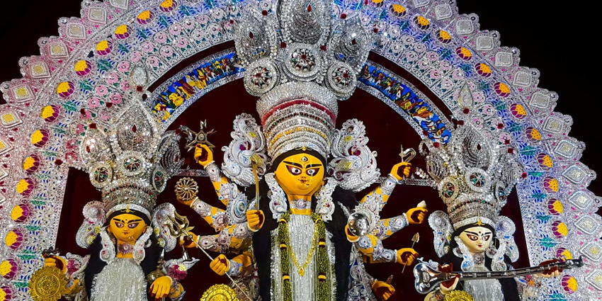Colourful statue of Goddess Durga, showcasing intricate details and vibrant decorations