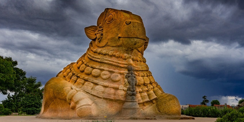 A majestic temple with a monolithic Nandi statue, offering panoramic views of Mysore, one of the best places to visit near Mysore Palace.