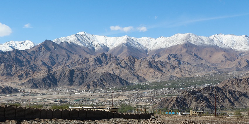 Aerial view of the Stok Village surrounded by the Stok Kangri Peaks.