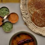 Platter of South Indian delicacies like appam and Uttapam, among the best street food in Koregaon Park.