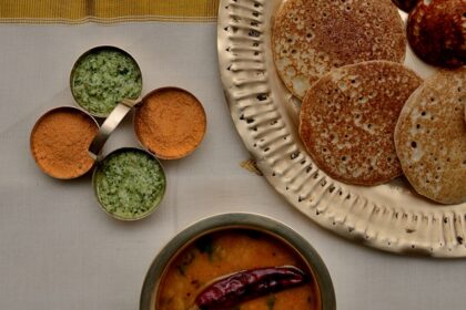 Platter of South Indian delicacies like appam and Uttapam, among the best street food in Koregaon Park.