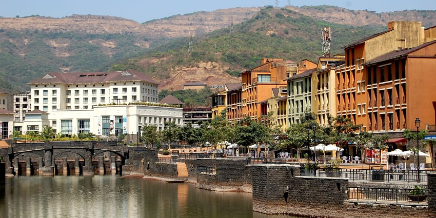 Lakeside Promenade, where people take walks and enjoy the area near serene Dasve Lake.
