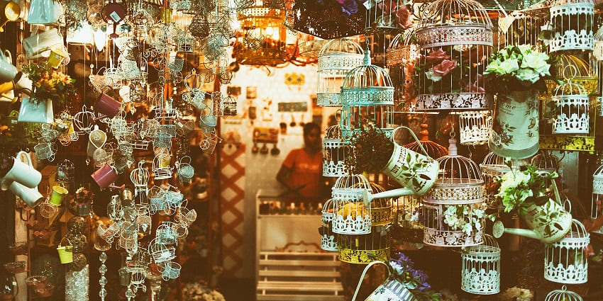  A vibrant local market in Panshet, filled with stalls offering fresh and handicrafts.