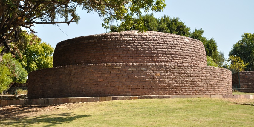 A view of Stupa No. 4, an ancient Buddhist Stupa with stone carvings at Sanchi.