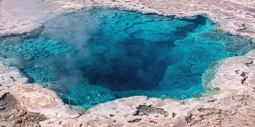 View of a small blue hot spring, one of the best hot springs in Ladakh for serenity seekers
