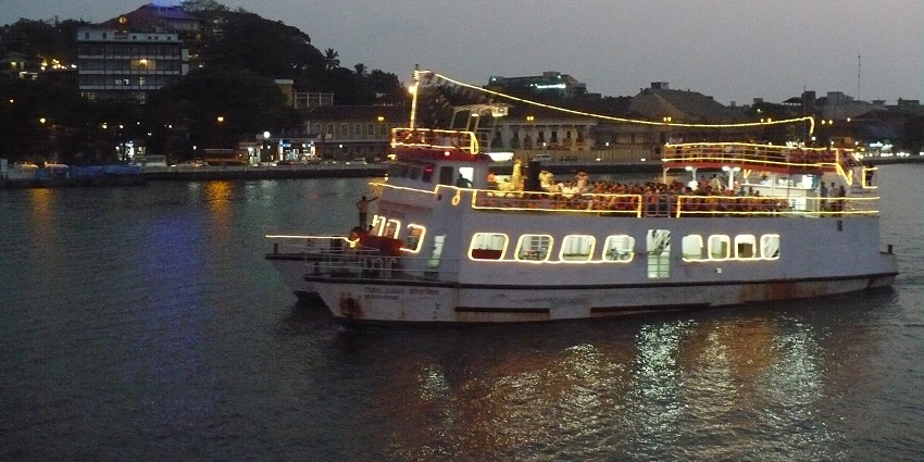Enjoy the beautiful sunset on Mandovi river in Goa - One of the best places to visit in Goa and explore