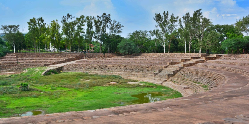 Panoramic image of the beautiful Suraj Kund Masonry amidst the Aravalli hills