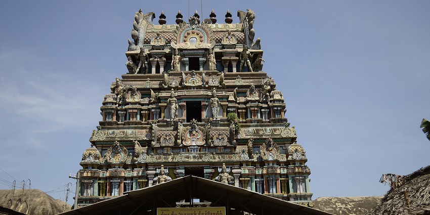 An Image showcasing the intricate designs on the exteriors of the famous Suriyanar Kovil.