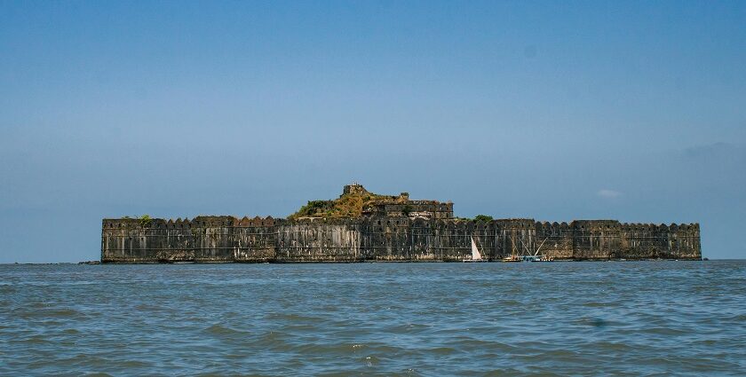 Panoramic view of the iconic Suvarnadurg Fort across the river body in Maharashtra