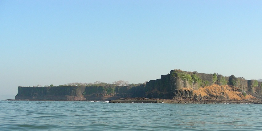 Rugged fort perched on a hill with scenic landscapes and the clear ocean view